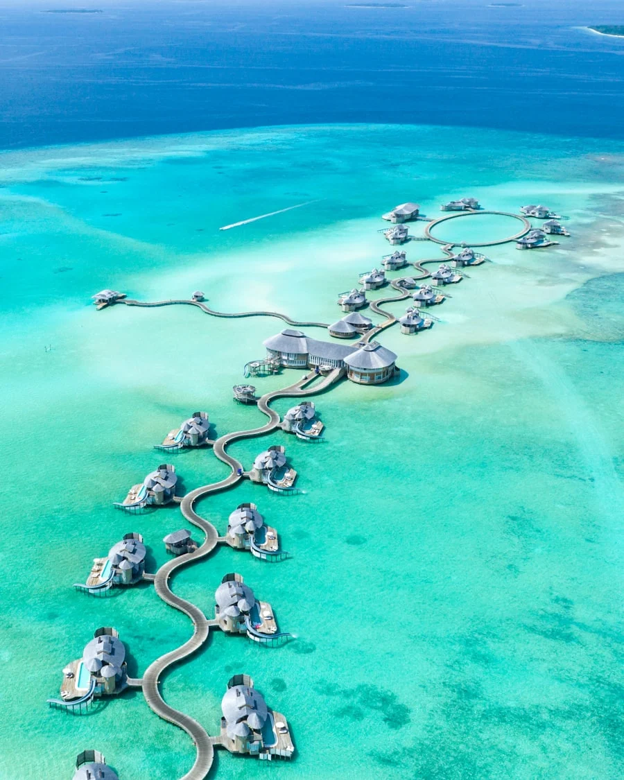 Overwater bungalows with turquoise lagoon — Maldives honeymoon package from India